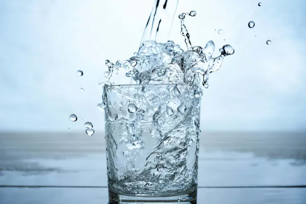 Clean drinking water being poured into a glass